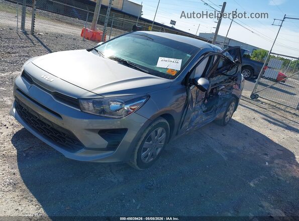 3KPA24AD9PE556803 2023 KIA RIO Silver Vista tres cuartos delantera izquierda