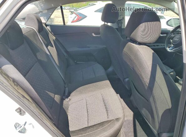 3KPA24AD9PE574444 2023 KIA RIO White Rear seats view