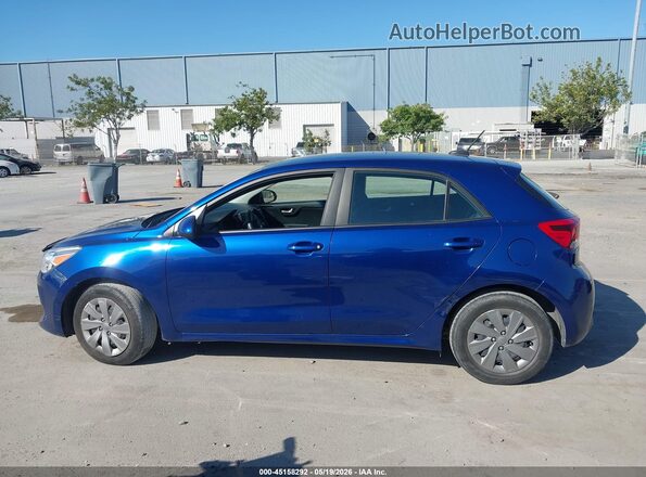 3KPA25AD4LE349414 2020 KIA RIO 5-DOOR Blue Rear interior view
