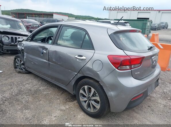 3KPA25AD6PE628627 2023 KIA RIO 5-DOOR Gray Rear left