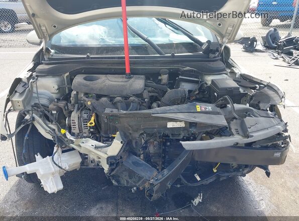 3KPC24A3XJE008638 2018 HYUNDAI ACCENT Gold Rear view