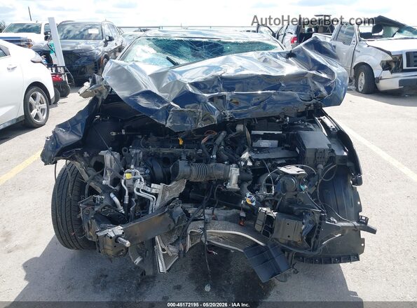 3KPF24AD0ME277337 2021 KIA FORTE Black Rear interior view