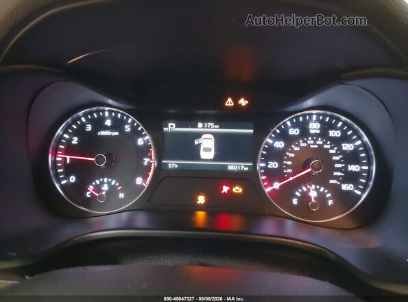3KPF24AD0RE707858 2024 KIA FORTE Red Vista de los asientos traseros