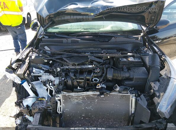 3KPF24AD1RE702717 2024 KIA FORTE Black Вид ззаду