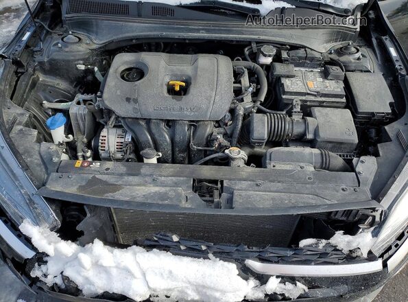 3KPF24AD4RE697593 2024 KIA FORTE Black Vista interior trasera