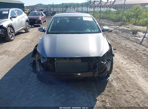 3KPF24AD7RE705802 2024 KIA FORTE Beige Rear interior view