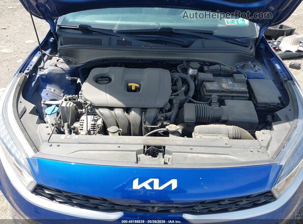 3KPF24ADXPE585796 2023 KIA FORTE Blue Вид ззаду