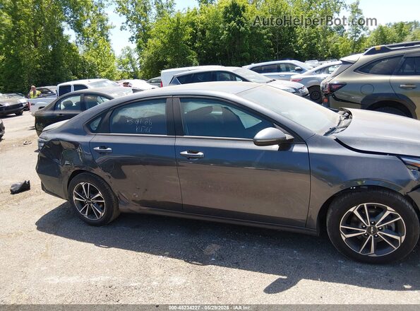 3KPF24ADXPE622121 2023 KIA FORTE Gray Vista interior trasera