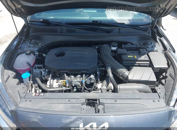 3KPF44AC1RE804259 2024 KIA FORTE Gray Rear view