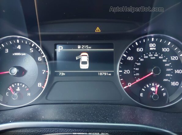 3KPF44AC2RE832877 2024 KIA FORTE White Vista de los asientos traseros