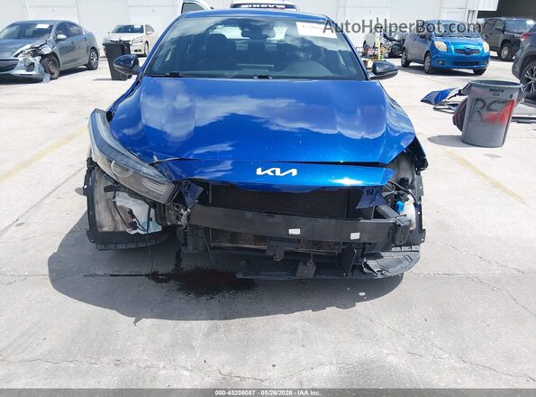 3KPF54AD2RE776218 2024 KIA FORTE Blue Vista interior trasera