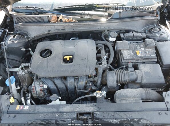 3KPF54AD8RE710496 2024 KIA FORTE Black Rear view