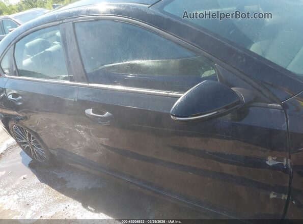 3KPF54AD8RE710496 2024 KIA FORTE Black Rear interior view