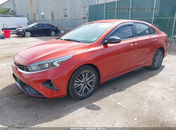 3KPF54AD9NE441371 2022 KIA FORTE Orange Vista tres cuartos delantera izquierda
