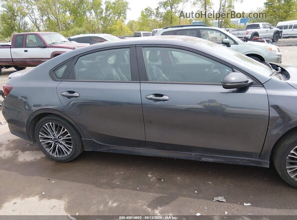 3KPF54AD9PE598594 2023 KIA FORTE Серый Вид задней части салона