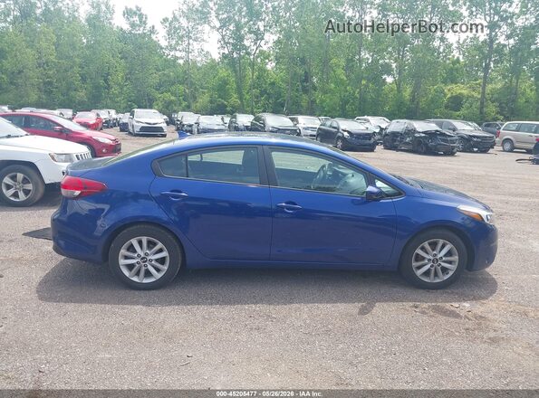 3KPFL4A76HE100398 2017 KIA FORTE Синий Вид задней части салона