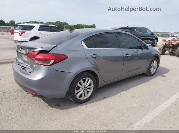3KPFL4A79HE037877 2017 KIA FORTE Blue Trasero derecho
