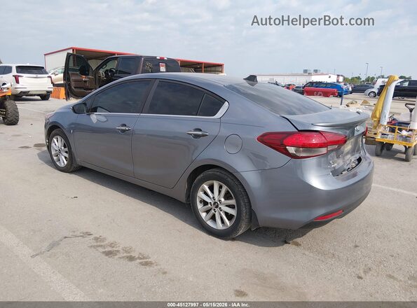 3KPFL4A79HE037877 2017 KIA FORTE Blue Trasero izquierdo