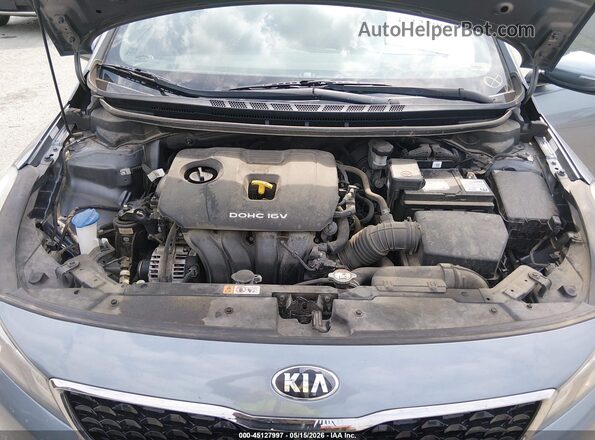 3KPFL4A79HE037877 2017 KIA FORTE Blue Vista trasera