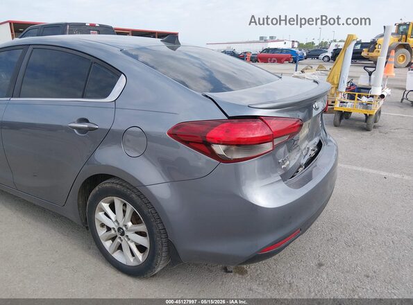 3KPFL4A79HE037877 2017 KIA FORTE Blue Vista del cuadro de instrumentos