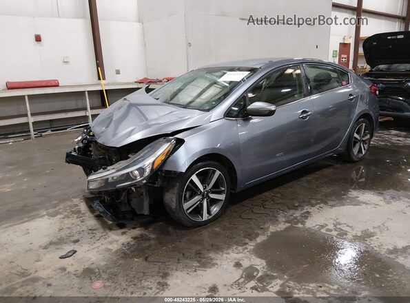 3KPFL4A8XHE110666 2017 KIA FORTE Blue Przód lewy