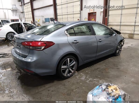 3KPFL4A8XHE110666 2017 KIA FORTE Blue Tył prawy