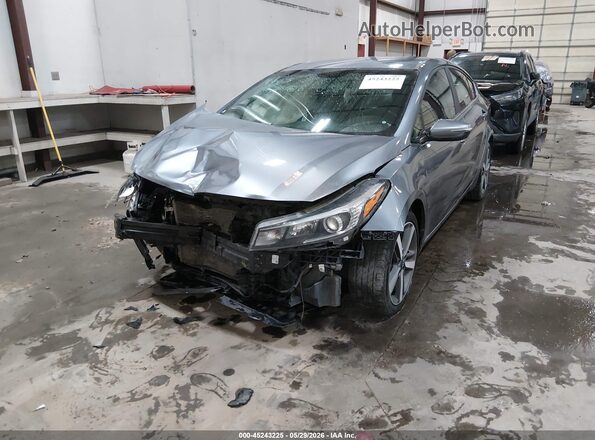 3KPFL4A8XHE110666 2017 KIA FORTE Blue Widok z przodu