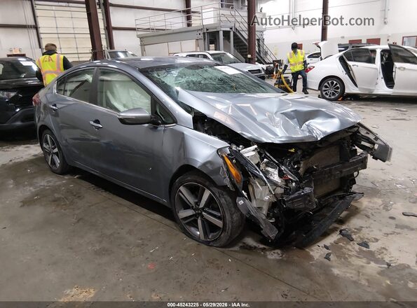 3KPFL4A8XHE110666 2017 KIA FORTE Blue Widok wnętrza z tyłu