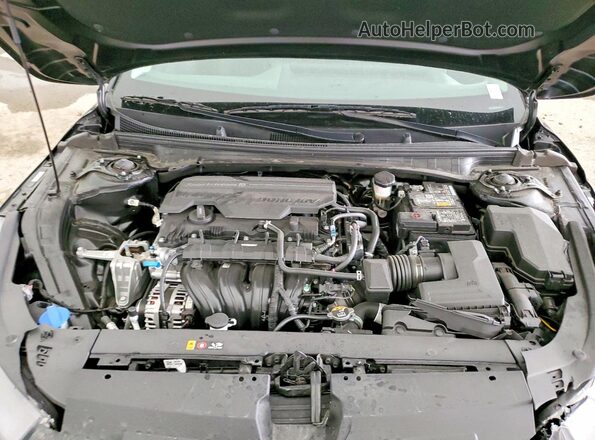 3KPFT4DEXSE236650 2025 KIA K4 Black Սալոնի հետևի տեսք