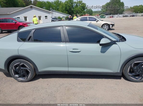 3KPFU4DEXSE011089 2025 KIA K4 Light Blue Vista interior trasera