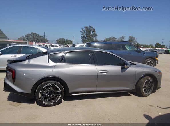 3KPFW4DE9SE099420 2025 KIA K4 Gray Widok wnętrza z tyłu