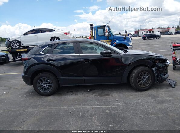 3MVDMBAM5RM672678 2024 MAZDA CX-30 Black Rear interior view