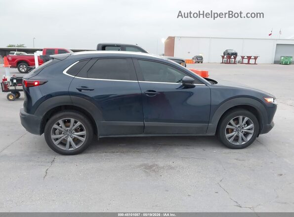 3MVDMBCM2SM815900 2025 MAZDA CX-30 Blue Rear interior view