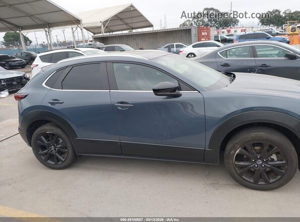 3MVDMBCMXRM660216 2024 MAZDA CX-30 Синий Вид задней части салона