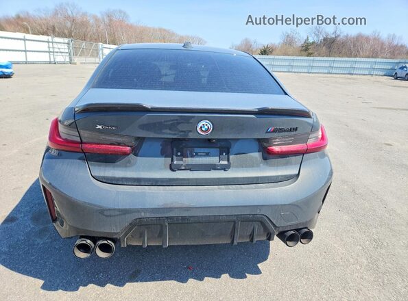 3MW49FF09P8D38379 2023 BMW M3 Серый Вид сзади