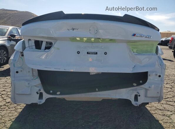 3MW49FS07P8C98017 2023 BMW M3 White Rear view