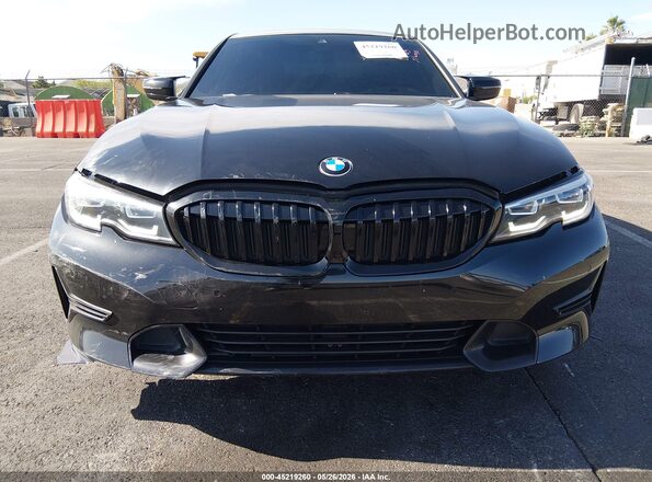 3MW5R1J01L8B04763 2020 BMW 3 SERIES Black Vista interior trasera