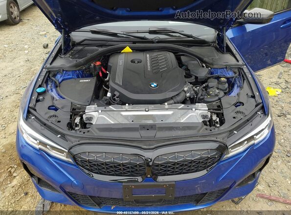 3MW5U7J09L8B31372 2020 BMW M3 Синий Вид сзади