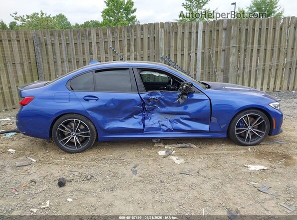 3MW5U7J09L8B31372 2020 BMW M3 Синий Вид задней части салона