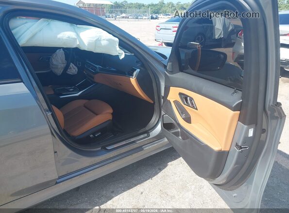 3MW69FF02P8D00114 2023 BMW 3 SERIES Gray Vista interior delantera