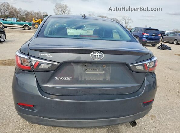 3MYDLBYV0KY509780 2019 TOYOTA YARIS Серый Вид сзади