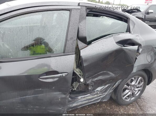 3MYDLBYV1KY513496 2019 TOYOTA YARIS Gray Вид спереду