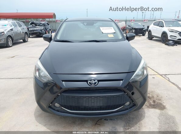 3MYDLBYV1KY515183 2019 TOYOTA YARIS Black Vista interior trasera