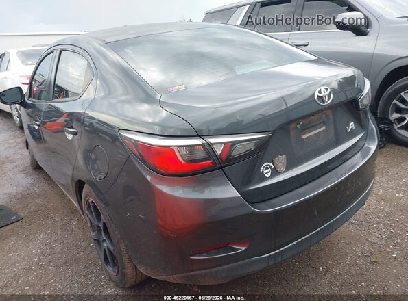 3MYDLBYV4HY175245 2017 TOYOTA YARIS IA Gray Trasero izquierdo