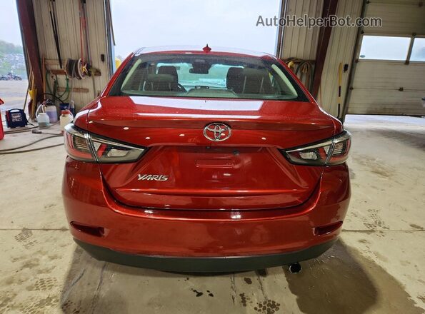 3MYDLBYV4LY709093 2020 TOYOTA YARIS Burgundy უკანა ხედი