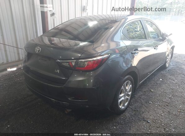 3MYDLBYV6HY153392 2017 TOYOTA YARIS IA Gray Trasero derecho