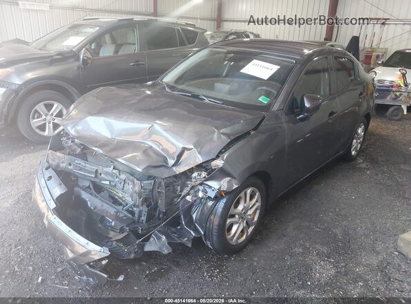 3MYDLBYV6HY153392 2017 TOYOTA YARIS IA Gray Vista tres cuartos delantera izquierda