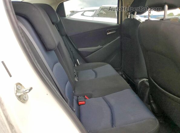 3MYDLBYV7JY320641 2018 TOYOTA YARIS White Rear seats view