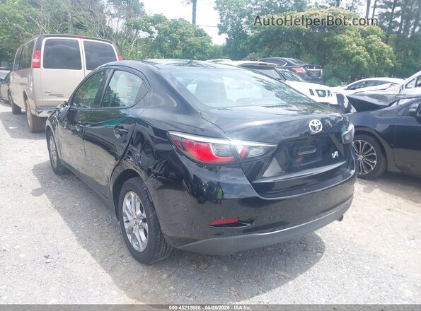 3MYDLBYV9JY302335 2018 TOYOTA YARIS IA Black Rear left