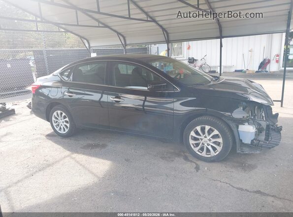 3N1AB7AP0KY291386 2019 NISSAN SENTRA Черный Вид задней части салона